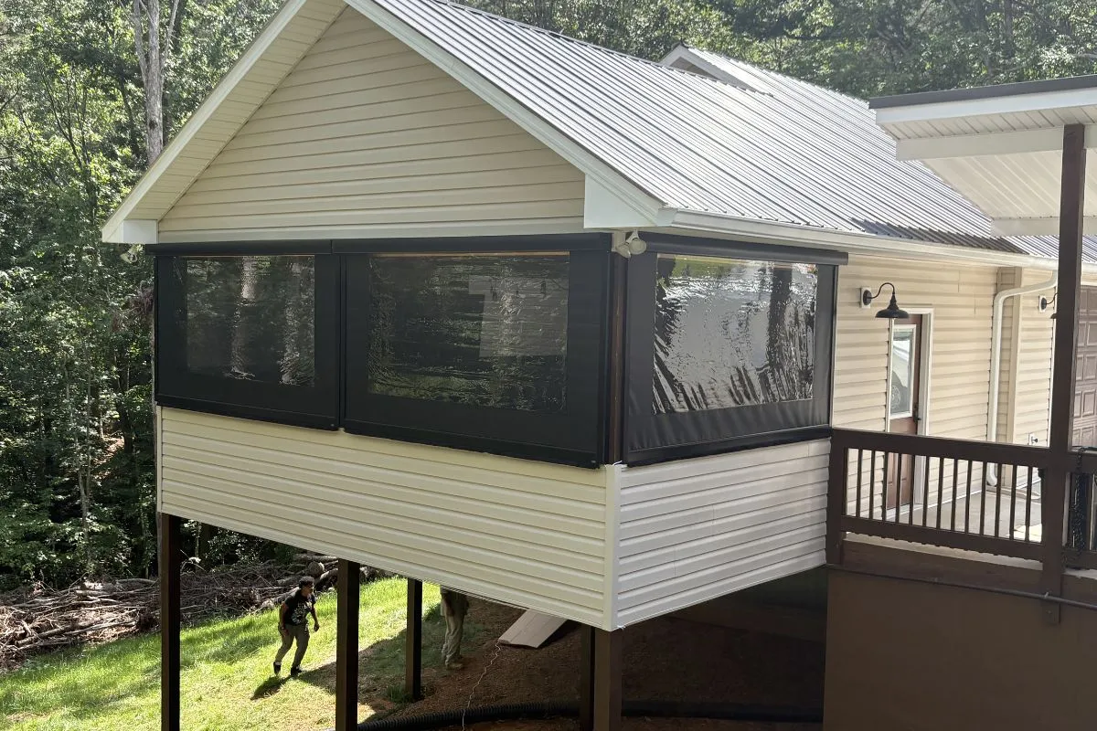 Motorized retractable patio screen deployed for bug protection and shade